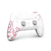 SCUF Omega Cherry Blossom PS5 controller, angled front view of white shell and pink flower pattern